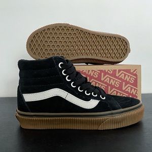 Vans high tops black suede gum soles
Brand new!